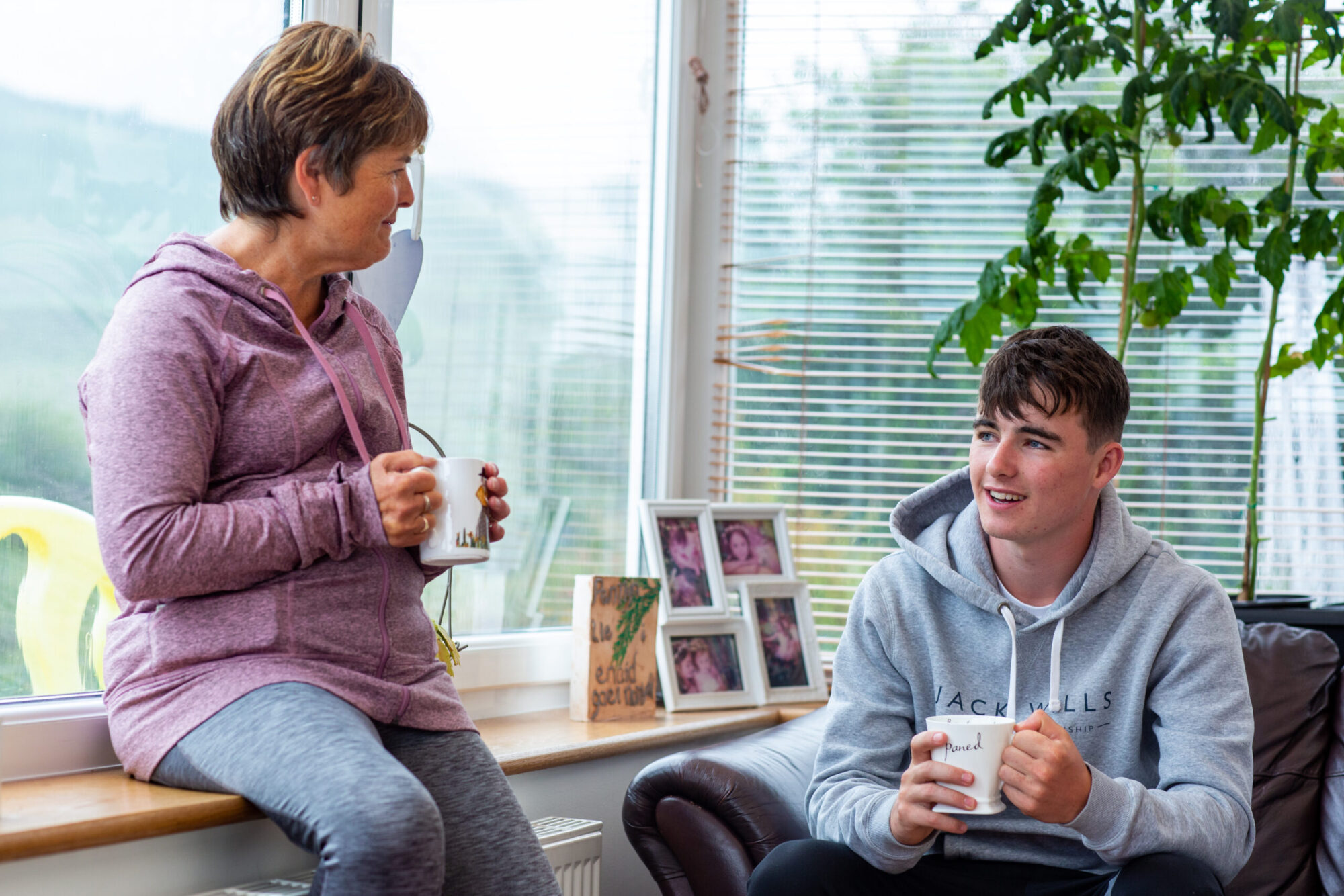 Woman and son drinking tea