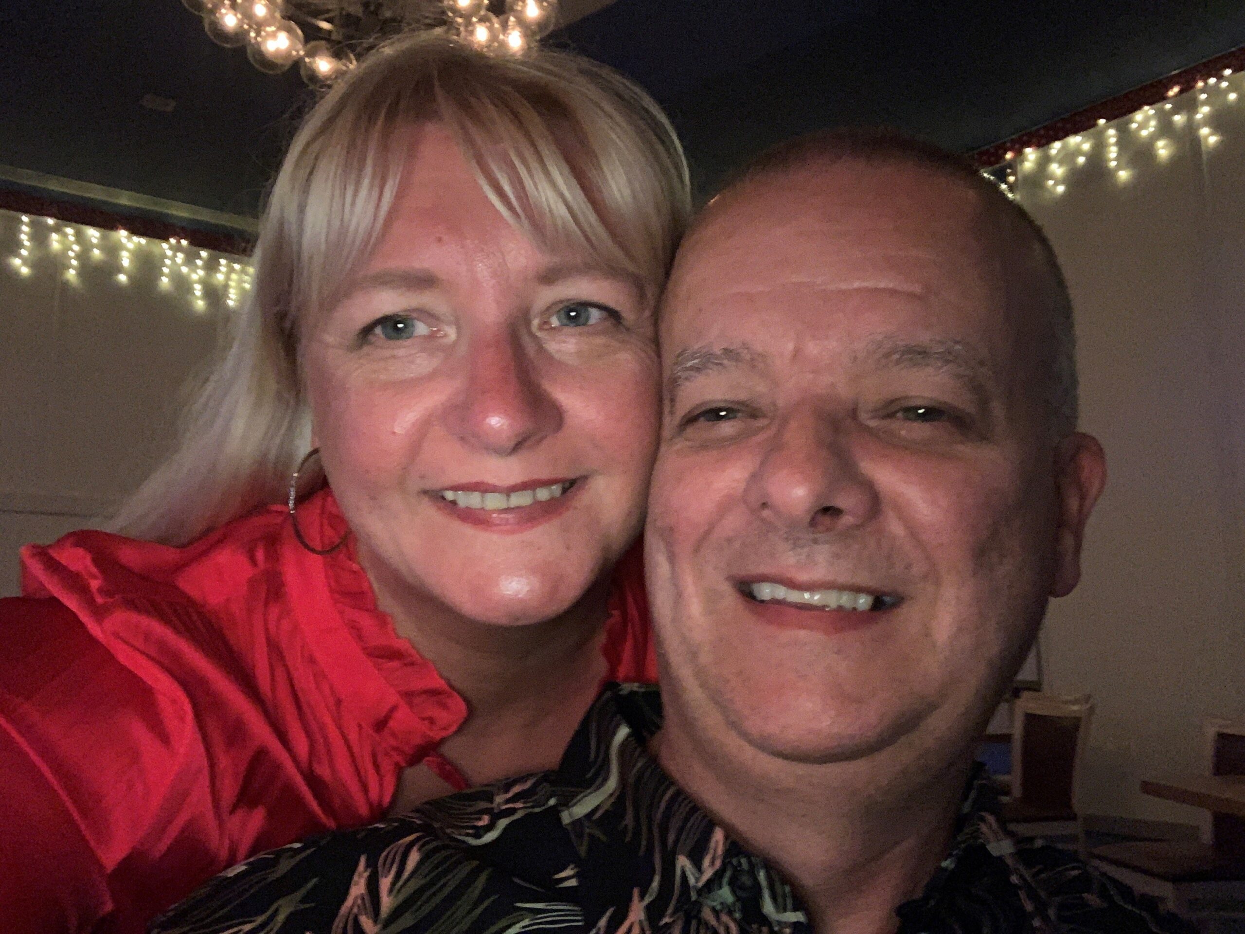 Two foster carers smiling